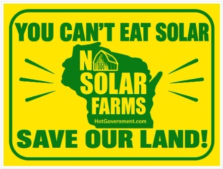 You can't eat solar. No solar farms. Save our land! HotGovernment.com. Green lettering on yellow with a Wisconsin outline.